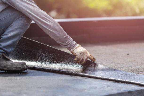 Professional Waterproofing technician working in Port Jefferson Station, NY